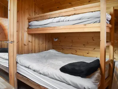 a couple of bunk beds in a wooden cabin at Barn Scar-Uk1394 in Corney