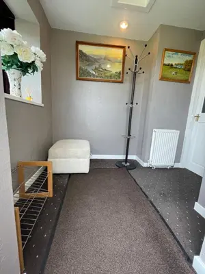 a room with a room with a bed and a room at Carminnows Holiday Cottage in Carsphairn