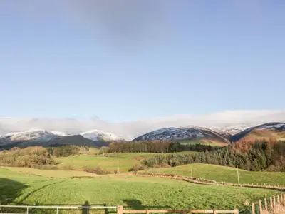 a view of the mountains from the farm at 1 Alpine Place in Thornhill