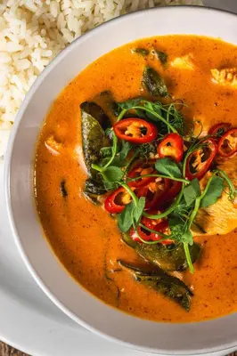 a bowl of soup with vegetables and rice at Seacote Hotel in St Bees