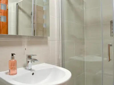 a bathroom with a sink and a shower at The Beeches in Bassenthwaite