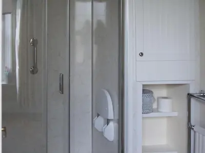 a shower stall with a toilet in a bathroom at Squirrels Retreat - Uk30821 in Braithwaite