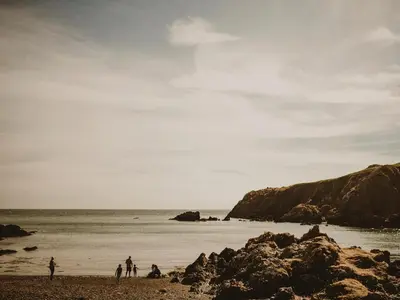 a group of people standing on the beach at Rose Blair Lodge - Uk31045 in Portpatrick