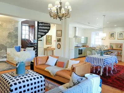 a living room with a couch and a table at The Royal Apartment - Uk31086 in Portpatrick