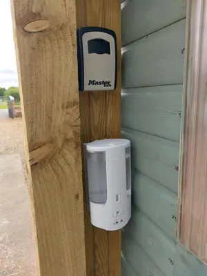 a soap dispenser on the side of a wall at Hadrians wall studio in Carlisle