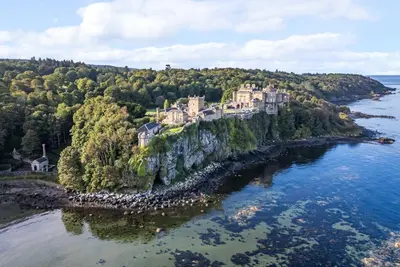 an island in the water with a castle on it at North Segganwell - Culzean Castle in Maybole