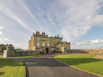 an old castle with a road in front of it at North Segganwell - Culzean Castle in Maybole