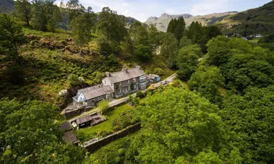 an aerial view of a house on a hill at The Stable At Oakbank in Elterwater