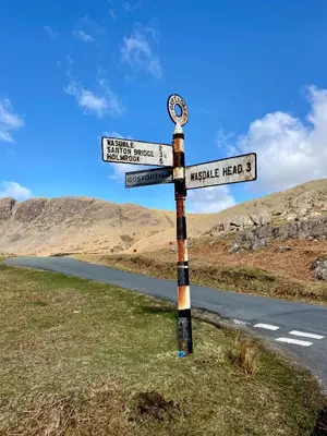 a street sign on the side of a road at Cumbrian Lodge in Seascale