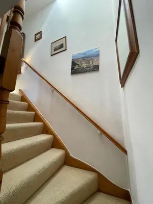 a set of stairs in a house at Robinsons Cottage, central and quiet in Cockermouth