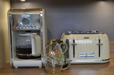 a group of appliances sitting on top of a table at Stunning Period Townhouse with Garden, Walking Distance to Town in Dumfries