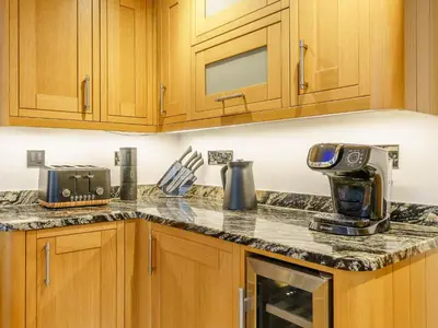 a kitchen counter top with a coffee maker on it at Herdwick View - Uk33668 in Bassenthwaite Lake