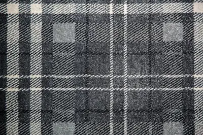a close up of a plaid fabric with at St Andrews Guest House in Irvine