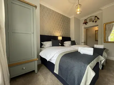 a bedroom with two beds in a room at Park View in Keswick