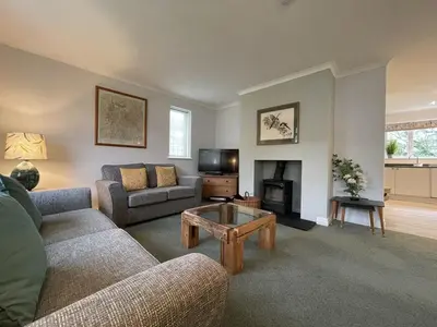a living room with a couch and a coffee table at Causey View in Braithwaite