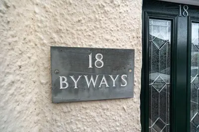 a sign on the side of a building that says byways at Byways in Keswick