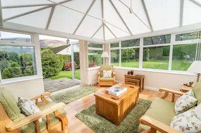 an open living room with a glass roof at Blencathra in Keswick