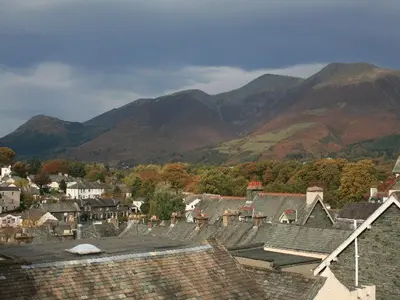 a town with houses and mountains in the background at Crandy Nook in Keswick