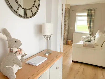 a stuffed rabbit sitting on a counter in a room at Float bay view in Stranraer