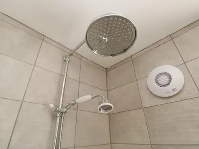 a shower with a shower head in a bathroom at 26 Hycemoor Way in Millom
