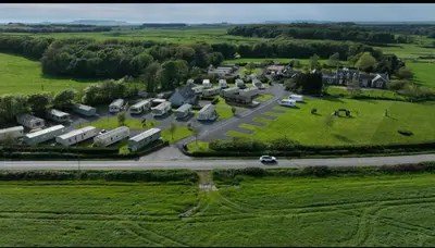 an aerial view of a large estate with a road at Happy Days Holiday Home Whithorn2 in Newton Stewart