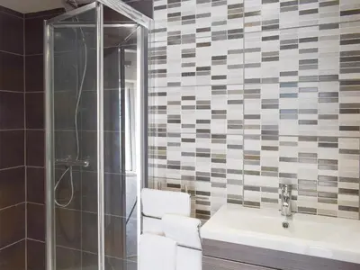 a bathroom with a sink and a shower at Uk7384 - The Hayloft in Newmilns