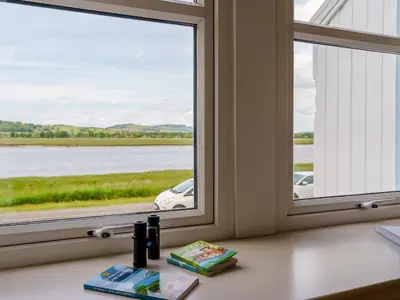 a window with a view of the water at Erriff At Caelaverock in Glencaple