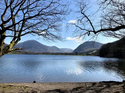 a view of a lake with mountains in the background at Penny End, Mosser - Western Lakes and great walks in Cockermouth