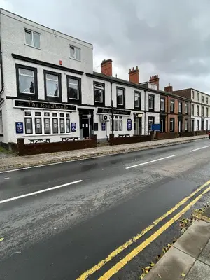 a building on the side of a street at The Roadhouse Hotel in Carlisle
