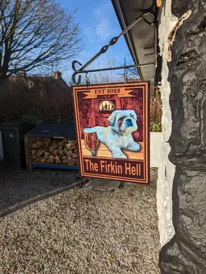 a sign for the fishin hell hanging on a building at The Stables - Bankshill in Lockerbie