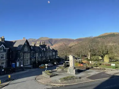a town with a monument in the middle of a street at Skiddaw View in Keswick