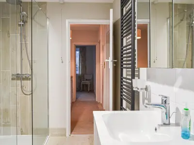 a bathroom with a sink and a shower at Parkfield in Keswick