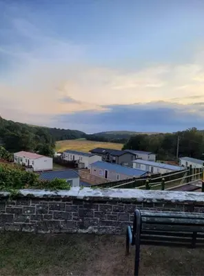 a view of a small town with a building at The Rabbit Hill Holiday Home in Ballantrae