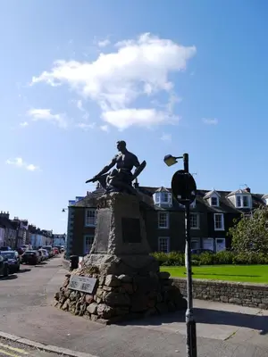 a statue in the middle of a street at The Fish House in Kirkcudbright