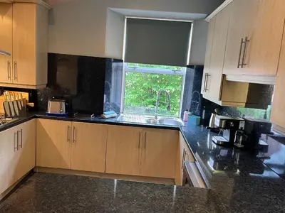 a kitchen with a sink and a window in it at River View in Dumfries
