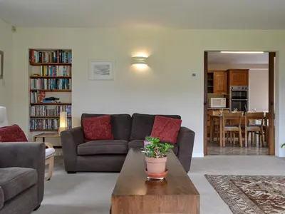 a living room with a couch and a coffee table at Fell View in Lorton
