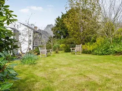 two chairs in the yard of a house at Six The Hollies in Keswick