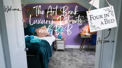 a room with a bed with a purple wall at The Art Bank in Dalbeattie