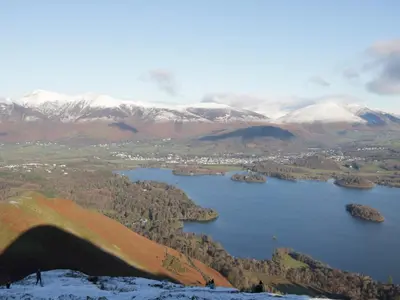 an aerial view of a lake in the mountains at Nook Cottage in Keswick