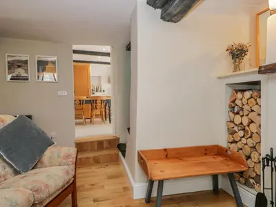 a living room with a couch and a table at Ashness in Keswick