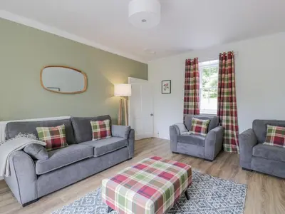 a living room with two couches and two chairs at Garden House - Culzean Castle in Maybole