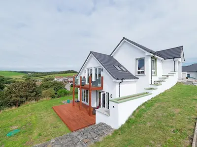 an image of a house on a hill at Seaviews And Hot Tub At Admirals Anchor in Portpatrick