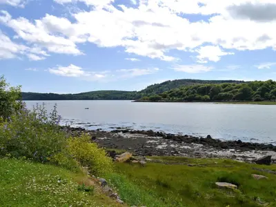 a view of a large body of water at Driftwood in Kippford
