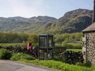 a phone booth on the side of a road at Newfield Apartment 1 in Broughton in Furness