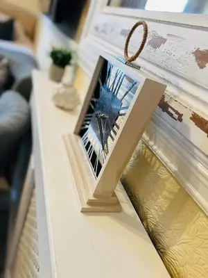 a picture frame sitting on top of a table at Ashleigh House in Carlisle