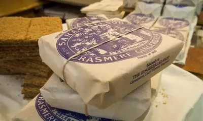 a stack of three slices of bread on a table at Riverville in Grasmere