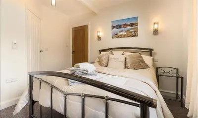 a bedroom with a bed in a room at Heathfield in Keswick