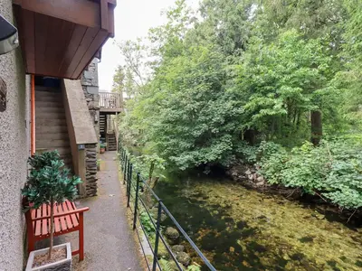 a view of a river from a balcony at Drystones in Grasmere