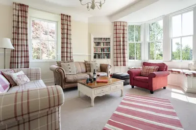 a living room with two couches and a coffee table at Wetherlam in Ambleside