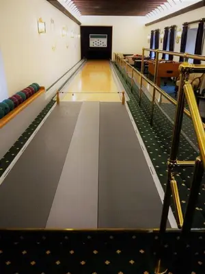 an empty bowling alley in a building at Lategillan Cottage in Polmood